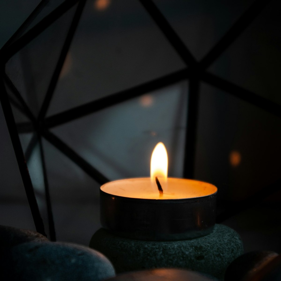 Candlelight and massage stones in the spa