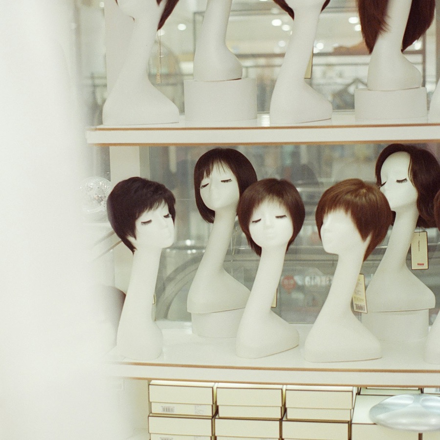 Wigs and toppers on display in The Studio